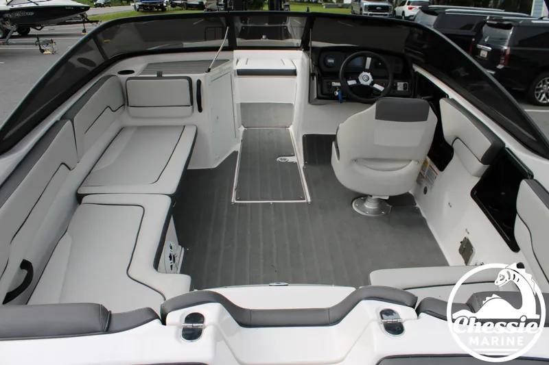 Slide: The Image of The image shows the cockpit of a 2022 Yamaha AR190 boat with gray and white seating. - 9