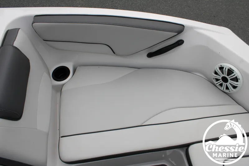 Slide: The Image of The image shows the seating area of a 2022 Yamaha AR190 boat with gray upholstery. - 17