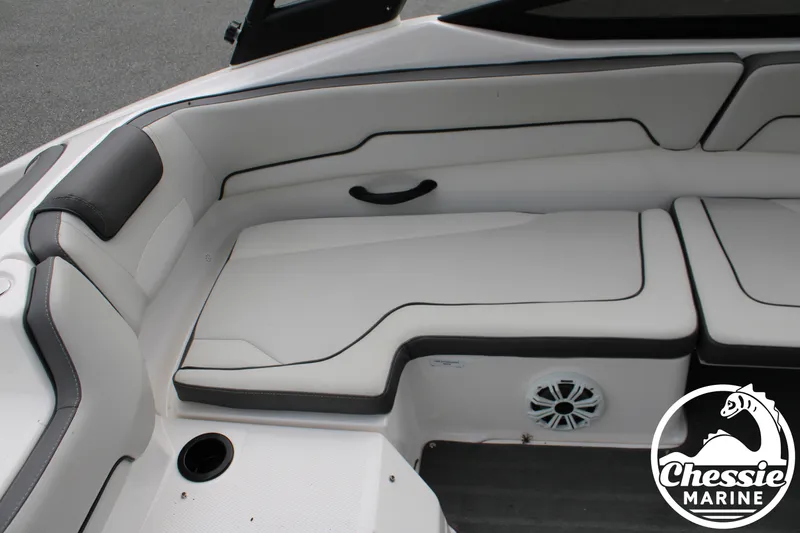 Slide: The Image of The image shows the white upholstery of a 2022 Yamaha AR190 with a speaker. - 12