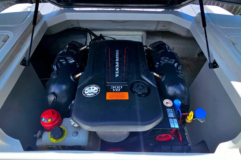 Slide: The Image of Engine compartment of 2023 Chaparral 23 SSi boat featuring Volvo Penta 300 V8 engine. - 12