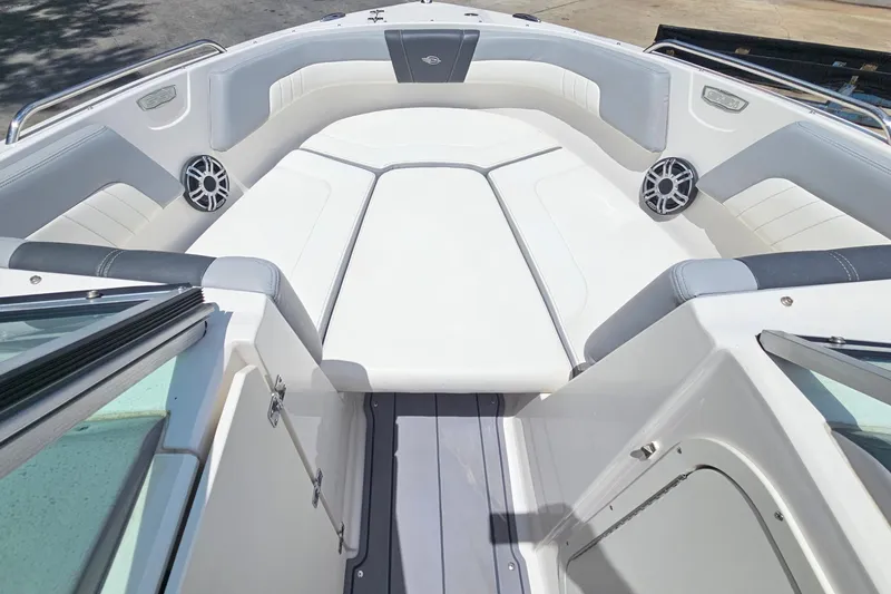 Slide: The Image of 2023 Chaparral 23 SSi boat interior with spacious seating and modern design. - 20