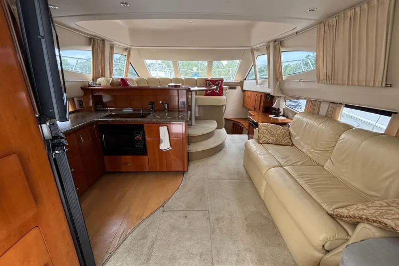 Slide: The Image of Luxurious interior of a 2004 Carver 360 Sport Sedan yacht with elegant furnishings. - 8