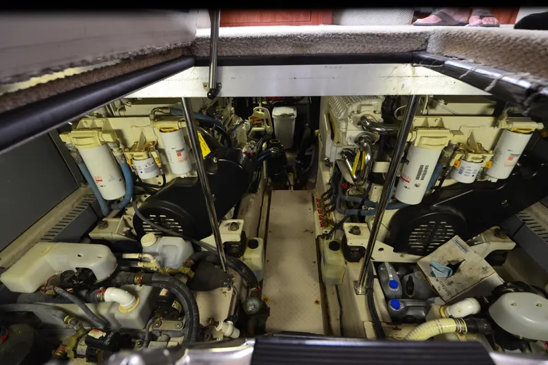Slide: The Image of Engine room of a 2004 Sea Ray 480 Motor Yacht, showcasing mechanical components. - 50