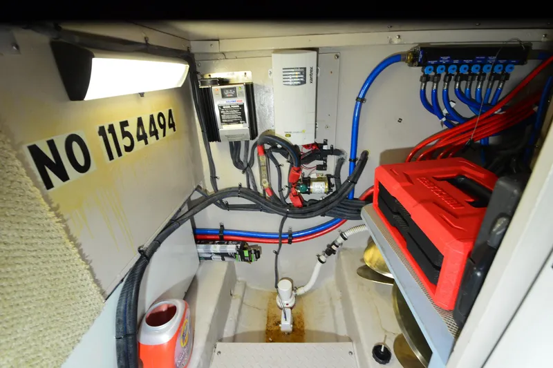 Slide: The Image of Engine room of 2004 Sea Ray 480 Motor Yacht with wiring and equipment. - 43