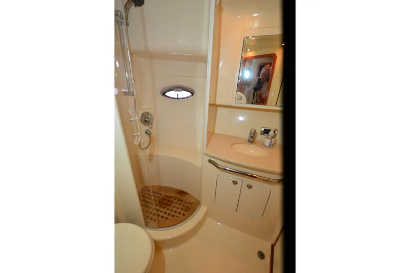 Slide: The Image of Bathroom interior of 2004 Sea Ray 480 Motor Yacht with shower and vanity. - 34