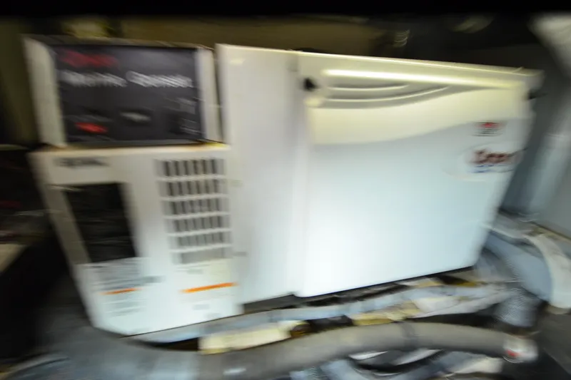 Slide: The Image of Blurry image of a 2004 Sea Ray 480 Motor Yacht engine room equipment. - 47