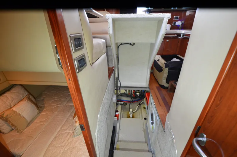 Slide: The Image of Interior view of a 2004 Sea Ray 480 Motor Yacht, showcasing cabin and utility area. - 41