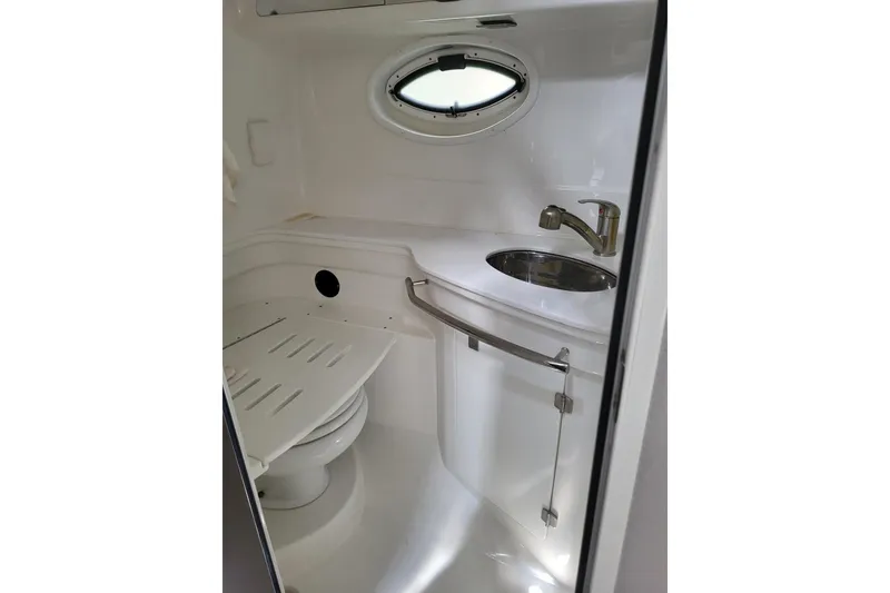 Slide: The Image of Compact bathroom in 2018 Monterey 335 Sport Yacht with sink and toilet. - 16