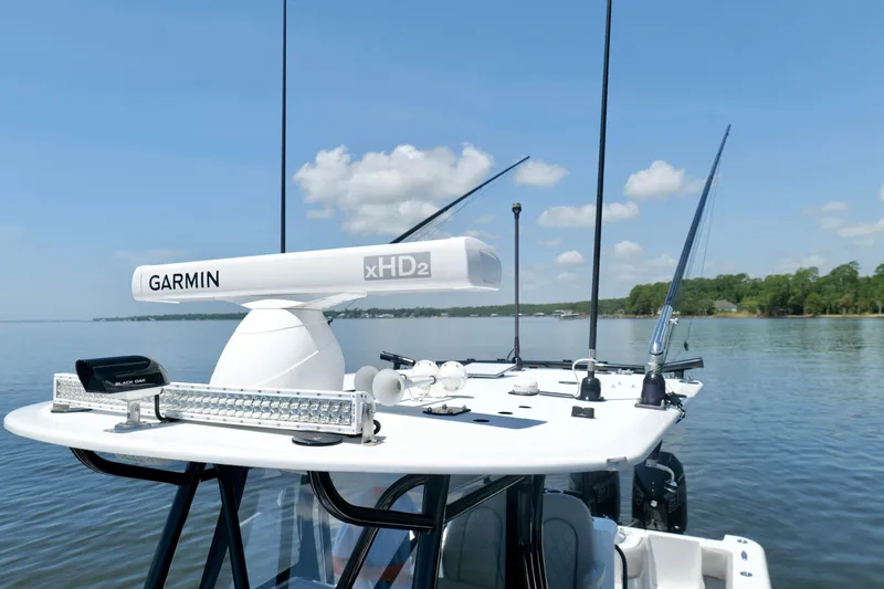 Slide: The Image of 2023 Andros 32 Offshore boat with Garmin xHD2 radar on calm water. - 41