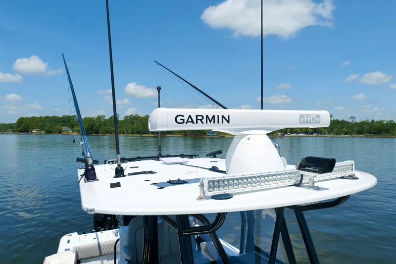 Slide: The Image of 2023 Andros 32 Offshore boat with Garmin xHD2 radar on calm water. - 39