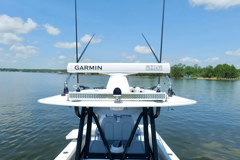 Slide: The Image of 2023 Andros 32 Offshore boat with Garmin xHD2 radar on calm water. - 40