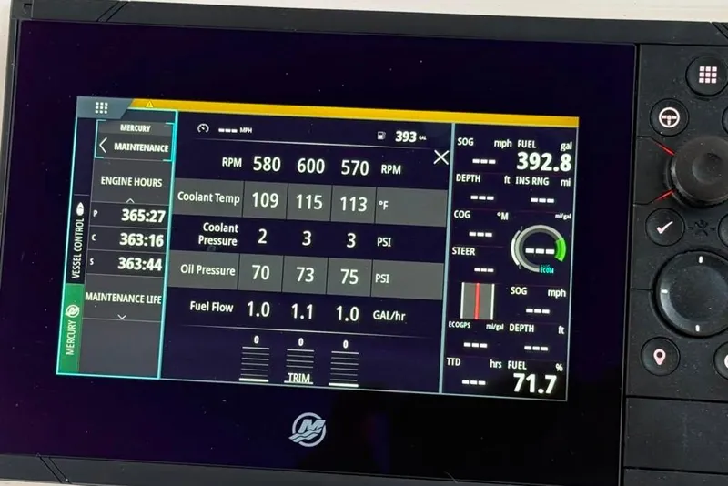 Slide: The Image of Digital display of a 2021 Intrepid 477 Evolution boat's engine metrics and performance data. - 9