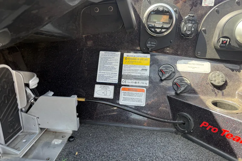 Slide: The Image of Control panel of a 2021 Nitro Z20 boat with various switches and labels. - 97