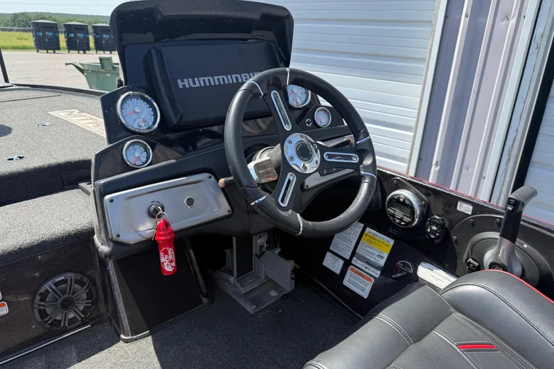 Slide: The Image of Steering console of a 2021 Nitro Z20 boat with gauges and Humminbird display. - 96