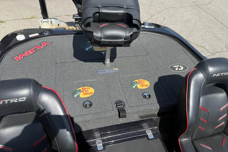 Slide: The Image of 2021 Nitro Z20 boat interior with branded seats and fishing gear logos. - 103