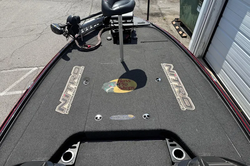 Slide: The Image of 2021 Nitro Z20 fishing boat deck with Bass Pro Shops logo and seating. - 93