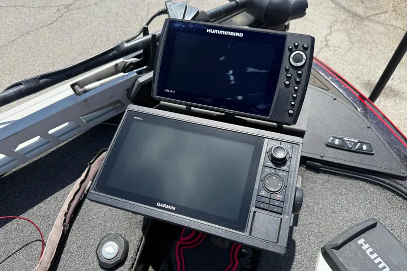 Slide: The Image of Boat dashboard with Humminbird and Garmin displays on a 2021 Nitro Z20. - 92
