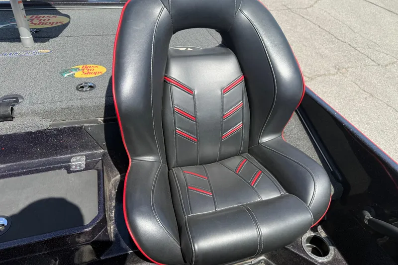 Slide: The Image of Black and red seat in a 2021 Nitro Z20 boat, featuring sleek design and stitching. - 101