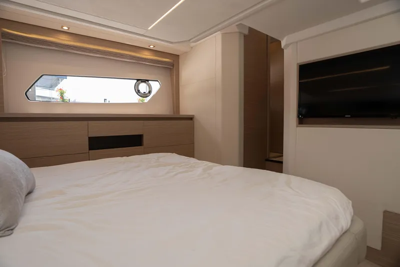 Slide: The Image of Luxurious bedroom interior of 2025 Pacific Prestige 460 Fly yacht with modern design. - 38