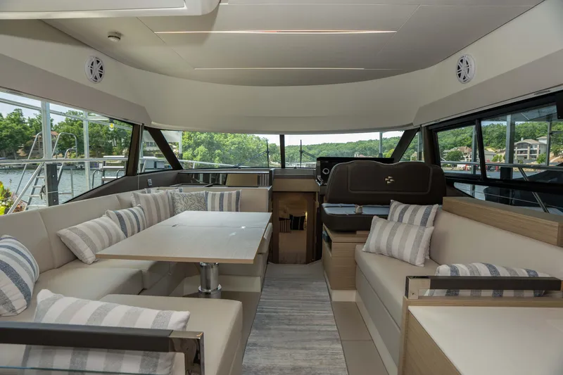 Slide: The Image of Luxurious interior of 2025 Pacific Prestige 460 Fly yacht with elegant seating and scenic views. - 48