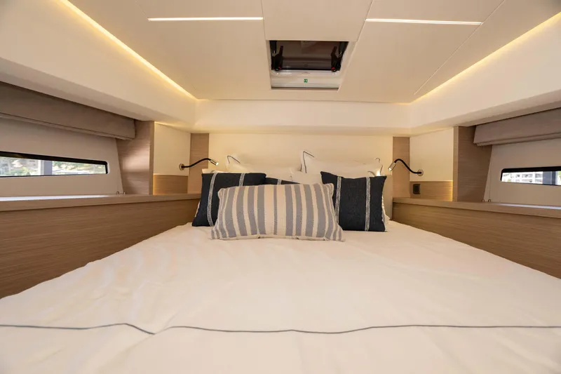 Slide: The Image of Luxurious bedroom interior of 2025 Pacific Prestige 460 Fly yacht with modern design. - 34