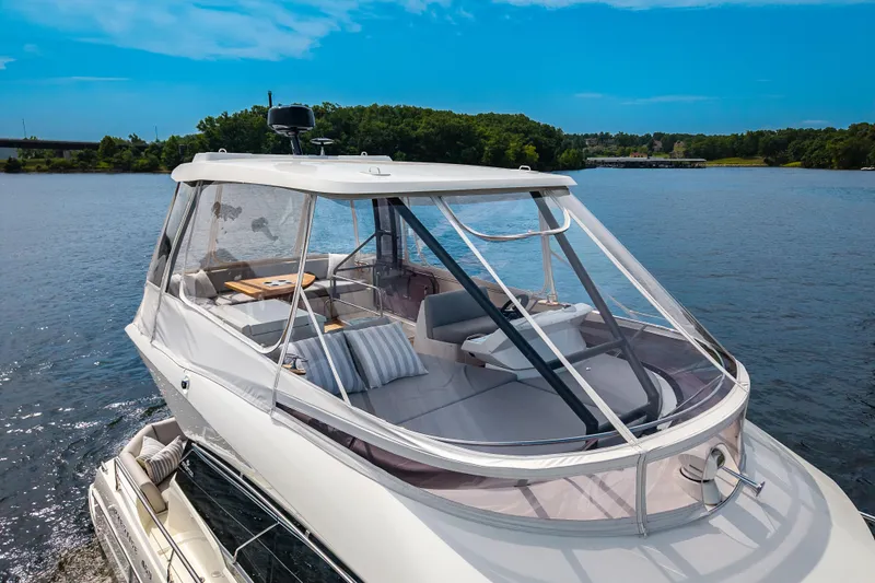 Slide: The Image of Luxurious 2025 Pacific Prestige 460 Fly yacht cruising on a serene lake. - 11