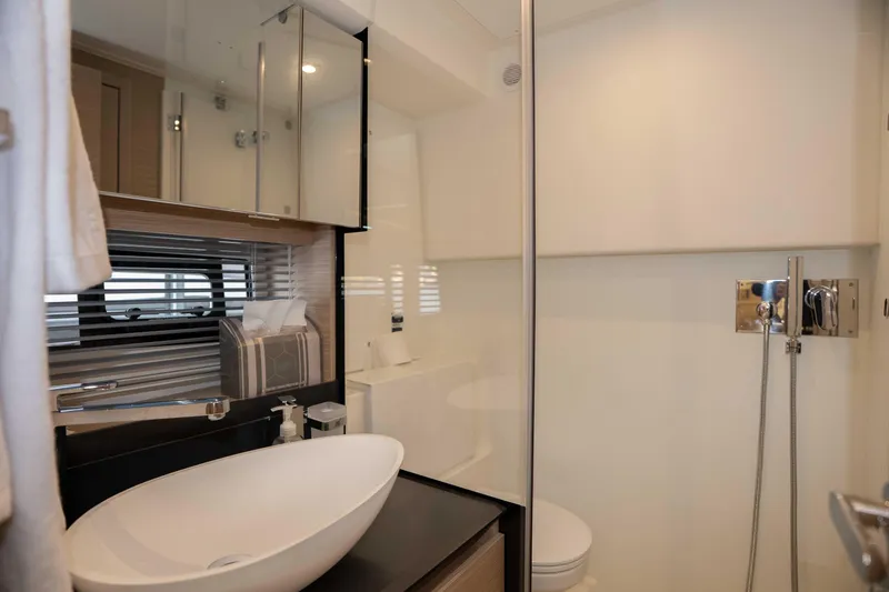 Slide: The Image of Luxurious bathroom in 2025 Pacific Prestige 460 Fly yacht, featuring modern fixtures and elegant design. - 32