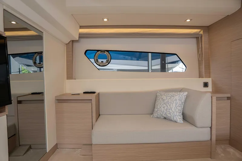Slide: The Image of Luxurious interior of 2025 Pacific Prestige 460 Fly yacht with modern seating and decor. - 40