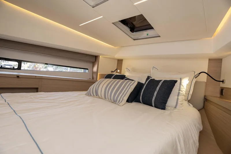 Slide: The Image of Luxurious bedroom interior of 2025 Pacific Prestige 460 Fly yacht with elegant bedding. - 33