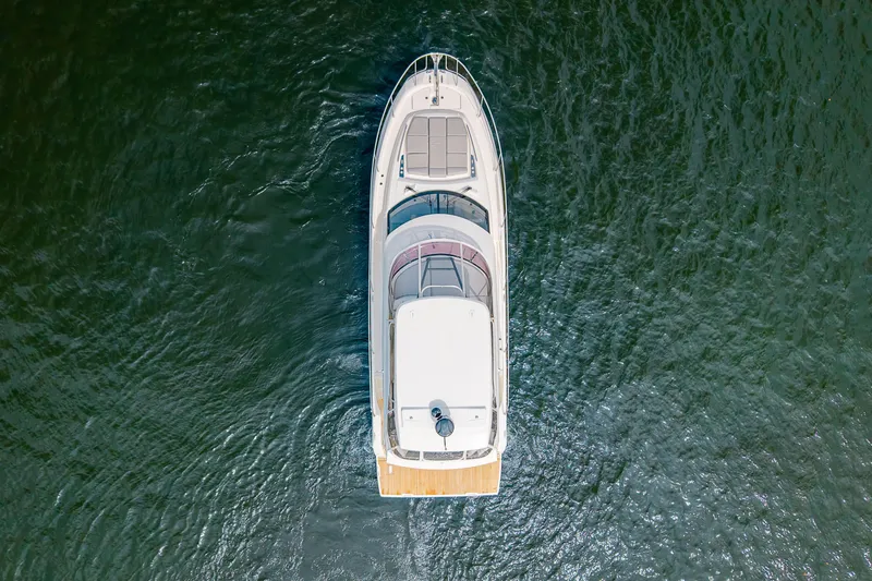 Slide: The Image of Aerial view of 2025 Pacific Prestige 460 Fly yacht on open water. - 17