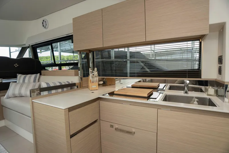 Slide: The Image of Modern kitchen interior of 2025 Pacific Prestige 460 Fly yacht with sleek cabinetry. - 43