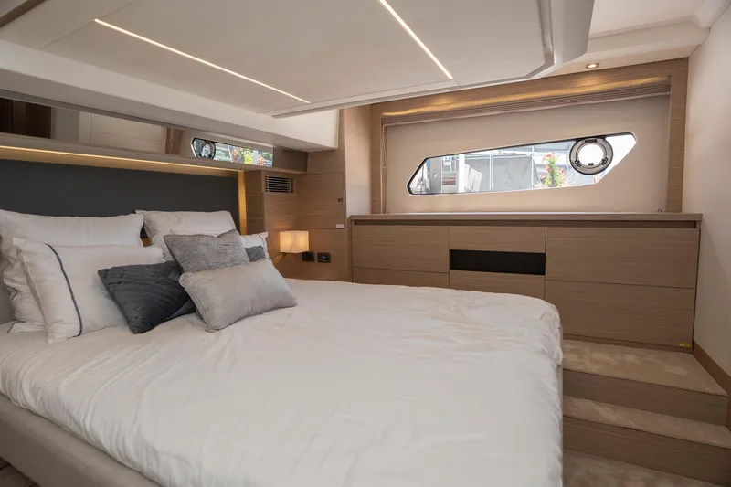 Slide: The Image of Luxurious bedroom interior of 2025 Pacific Prestige 460 Fly yacht with modern design. - 39