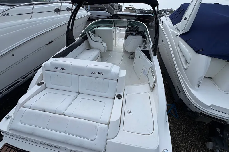Slide: The Image of 2014 Sea Ray 260 Sundeck boat with white seating and sleek design. - 13