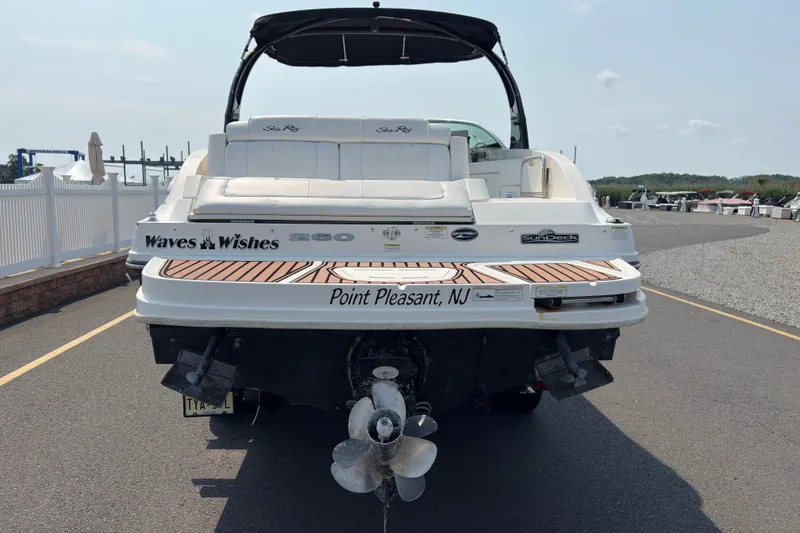 Slide: The Image of 2014 Sea Ray 260 Sundeck boat, rear view, docked in Point Pleasant, NJ. - 4