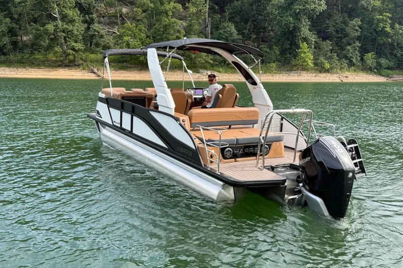 Slide: The Image of 2026 Harris Grand Mariner 230 SLDH pontoon boat on a serene lake. - 3