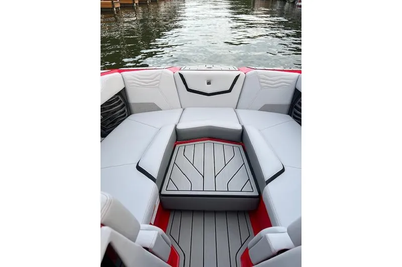 Slide: The Image of Luxurious interior of 2025 Nautique Super Air Nautique G23 boat. - 14