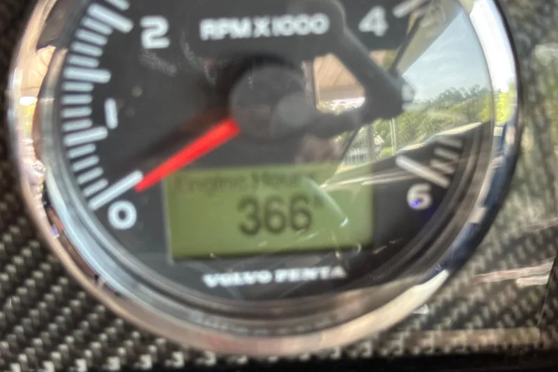 Slide: The Image of Close-up of a 2017 Four Winns H290 tachometer displaying 366 engine hours. - 47