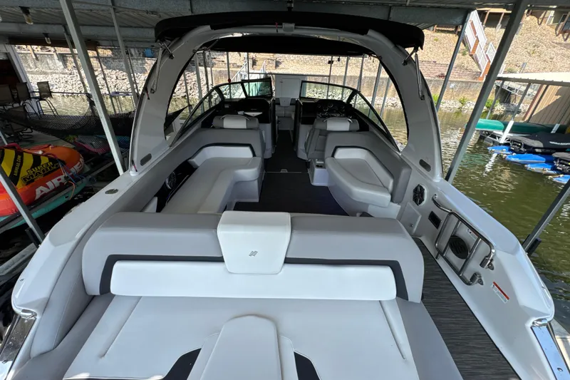Slide: The Image of 2017 Four Winns H290 boat interior with spacious seating and modern design. - 15