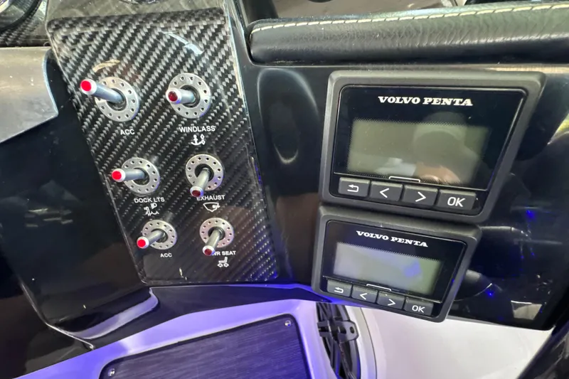 Slide: The Image of Control panel of a 2017 Four Winns H290 boat with Volvo Penta displays. - 46