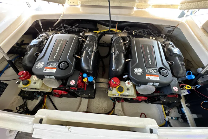 Slide: The Image of Twin Volvo Penta engines in a 2017 Four Winns H290 boat, showcasing powerful marine engineering. - 37