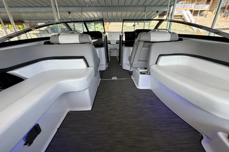 Slide: The Image of Interior of 2017 Four Winns H290 boat with sleek seating and modern design. - 17