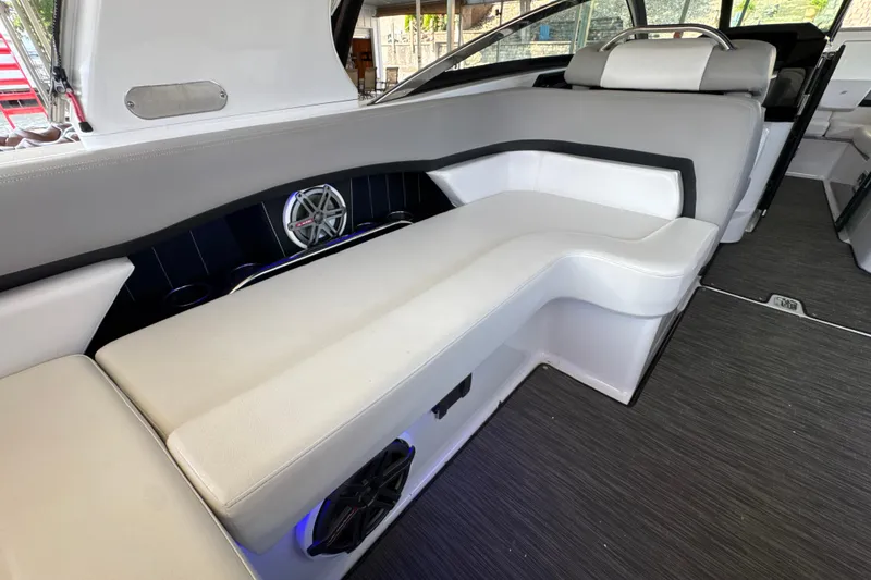 Slide: The Image of 2017 Four Winns H290 boat interior with sleek seating and modern design. - 25