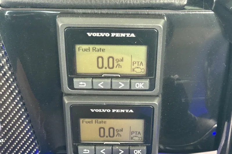 Slide: The Image of Volvo Penta fuel rate display on 2017 Four Winns H290 boat dashboard. - 42