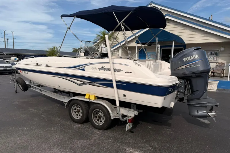 Slide: The Image of 2006 Hurricane FunDeck GS 211 OB boat with Yamaha engine on trailer. - 4