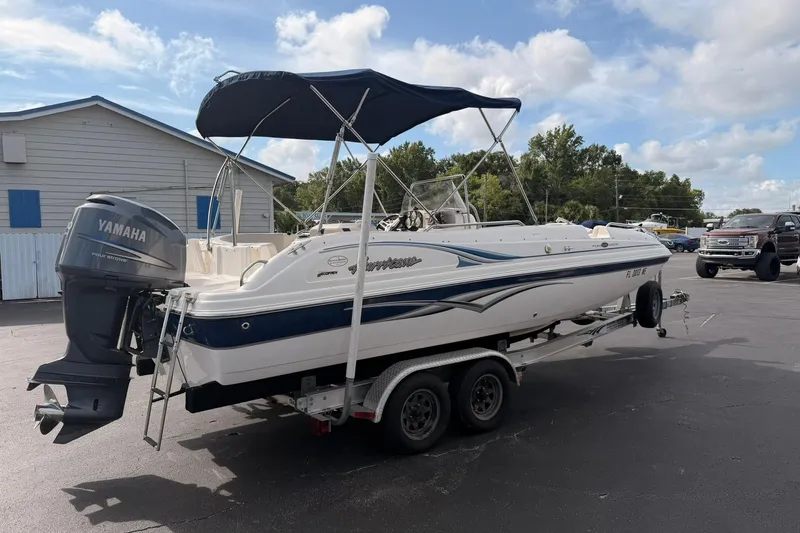 Slide: The Image of 2006 Hurricane FunDeck GS 211 OB boat on trailer with Yamaha outboard motor. - 8