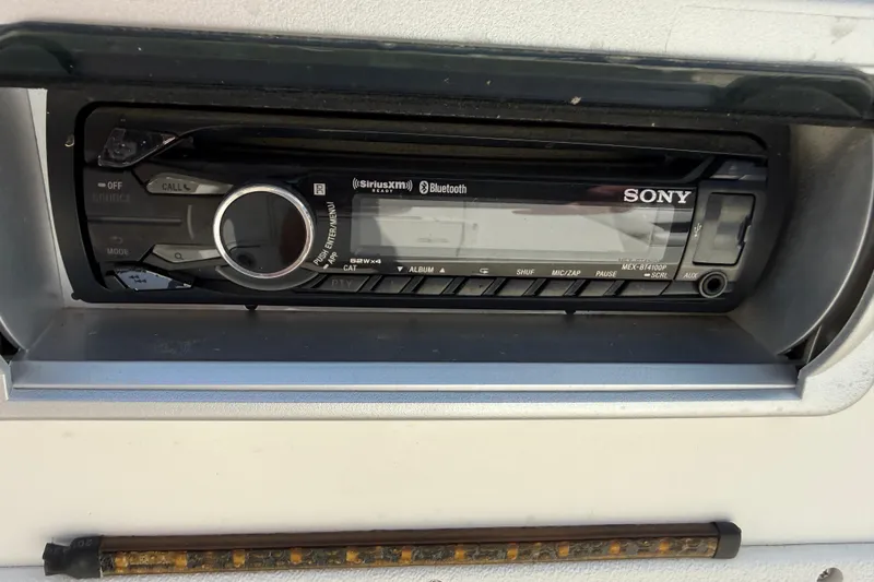 Slide: The Image of Sony stereo system in a 2014 Hurricane SunDeck Sport 188 OB boat dashboard. - 20