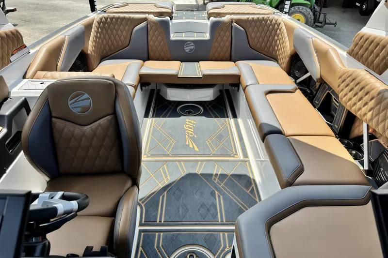 Slide: The Image of Luxurious interior of 2025 Tigé 24RZX boat with elegant seating and stylish design. - 17