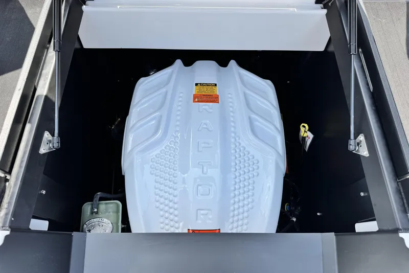 Slide: The Image of Engine compartment of 2025 Tigé 24RZX boat featuring a Raptor engine. - 19