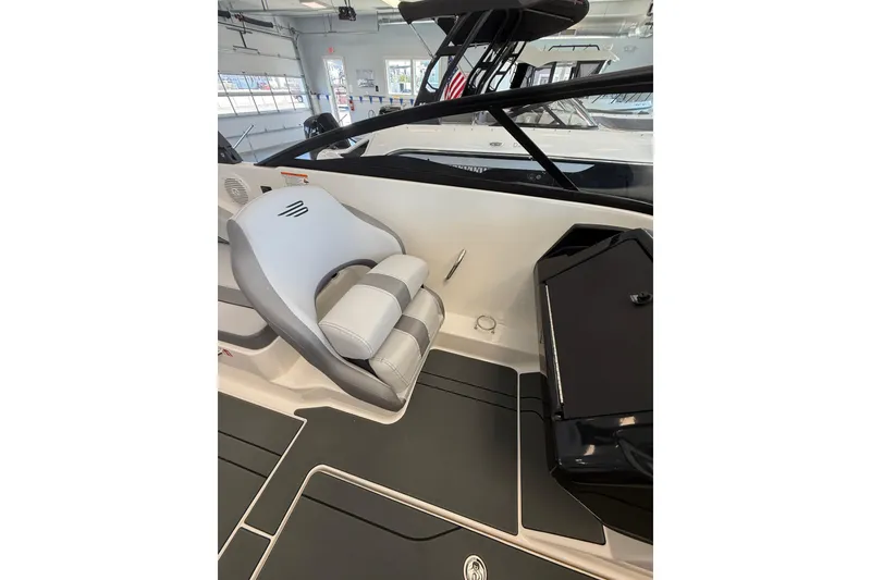 Slide: The Image of 2026 Bayliner V22 boat interior with sleek seating and modern design. - 6