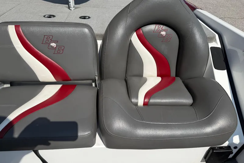 Slide: The Image of 2020 Bass Cat Pantera Classic boat seats with red and white accents. - 32